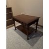 Image 3 : ark wood end table features a geometric apron design, a single side drawer, and a lower storage shel