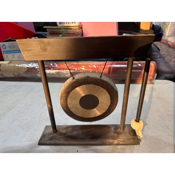 Woodstock table gong with a bronze gong and a dark wooden stand