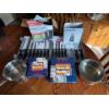 Image 1 : Two stainless steel pots, one set of 10 small Bake King burner guards, one set of 6 large Bake King 
