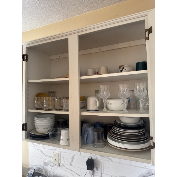 All glassware, mugs, bowls and plates in cabinetry included