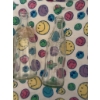 Image 5 : White wicker baby bassinet with folding legs, lace trim, fitted colorful smiley face fabric, and thr