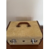 Image 4 : Calcraft Luggage Co. suitcase with a cream exterior, brown trim, metal hardware, and a brown handle.