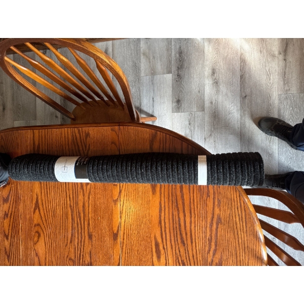 Indoor/outdoor utility mat with backing that grips to surfaces, 36in by 48in in black