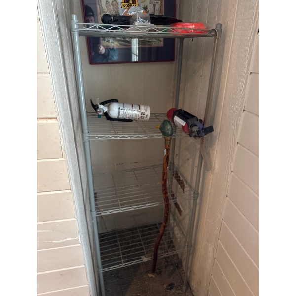 Metal rack, good for storing items, 60in tall, 20.5in wide and 14in deep.