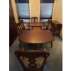 Image 6 :  dining table set is a traditional style furniture piece featuring a rich  solid cherry  and elegant