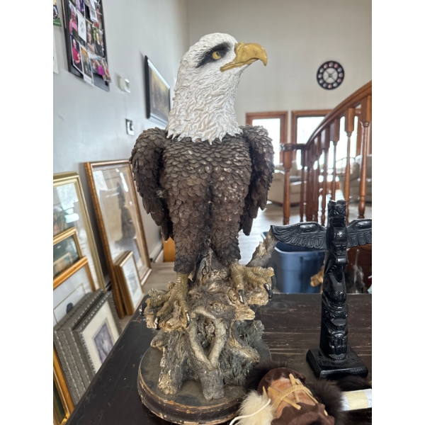 eagle statue, often referred to as an "American Pride" bald eagle figurine, typically designed for
