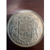 Image 4 : 1958 Canadian 50 cents coin featuring the young portrait of Queen Elizabeth II and the Canadian coat