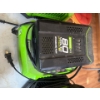 Image 1 :  Greenworks Pro 80V cordless tool battery charging on its dock.
Item: Greenworks 80V Pro Lithium-ion