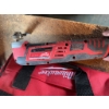 Image 5 : Milwaukee M12 cordless multi-tool with 12V Lithium-Ion battery, charger, and Milwaukee branded carry