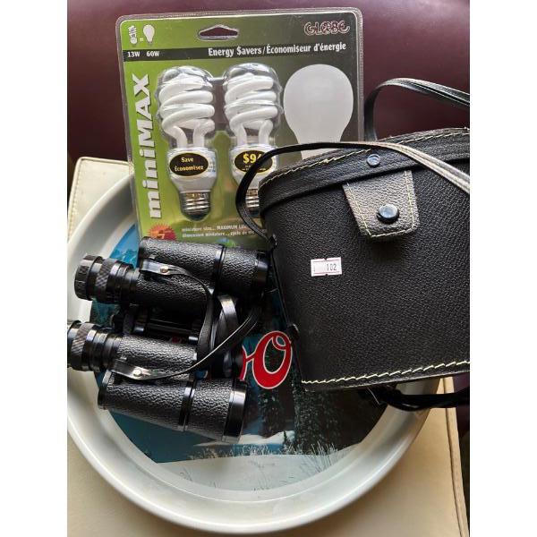 Coors serving tray, energy saver lights, vintage navigator seven by 35 binoculars.