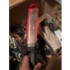 Image 2 : Variety of kitchen utensils, such as stainless steel egg beaters, kitchen knives with black handles,