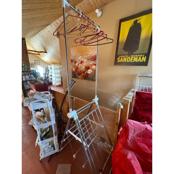 Stainless steel clothing rack with parts at the bottom to dry clothes, barely used condition and han