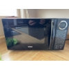 Image 3 : RCA brand microwave oven in black finish. Features digital control panel and turntable. Includes pre