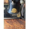 Image 16 : Singer treadle sewing machine, serial number 16165557, featuring original cast iron base and wooden 