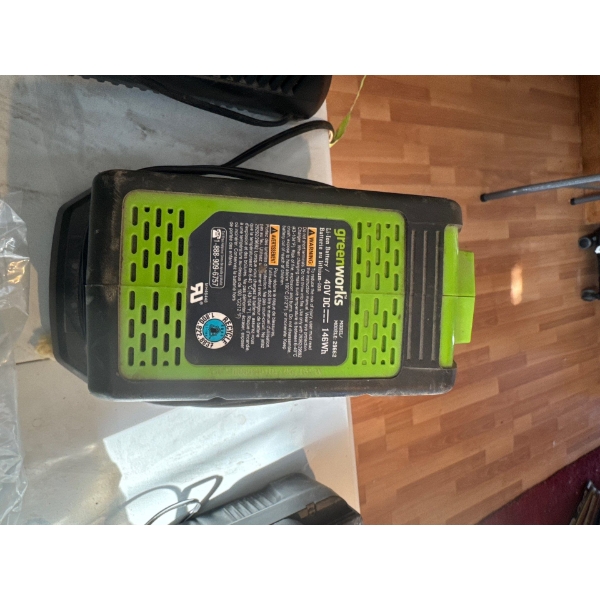 Worx 20V Max lithium-ion batteries and a charging station. 
Brand: Worx
Voltage: 20V
Battery Capacit