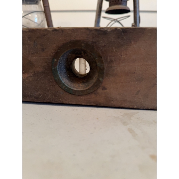 Wooden carpenter's level with brass fittings and inset bubble vial, featuring two viewing windows. T
