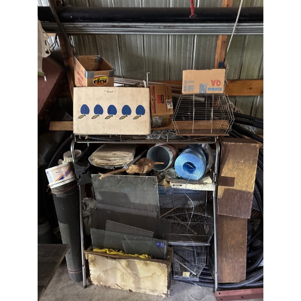 Shelving unit, bird cages, unknown items, cables, tubing, two inch water pump hoses, and more, all i