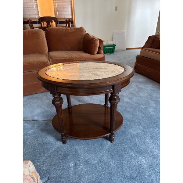  vintage-style side table features a classic round marble top set within a dark wood frame supported