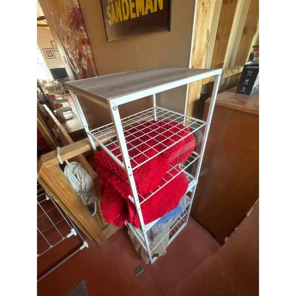 Nice metal storage rack with wood top, red rugs on shelves included, the dimensions are 16in wide, 5