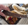 Image 2 :  handmade First Nations-style moccasins and mukluks, often crafted from moosehide and trimmed with f