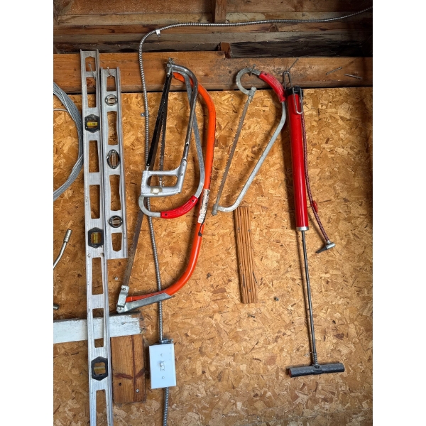 ALL HAND TOOLS AND ITEMS ON RIGHT SIDE OF WALL IN GARAGE 