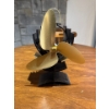 Image 3 : heat-powered wood stove fan, specifically identified as an Ecofan AirPlus. 