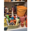 Image 2 : Collection of various household cleaning supplies The collection includes multi-purpose cleaners, sp
