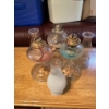 Image 4 : collection of vintage glass oil lamps, also known as kerosene or hurricane lamps. 
Function: These l