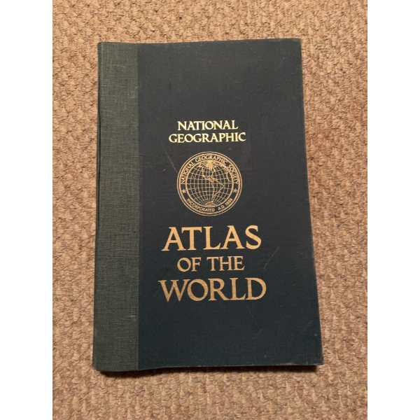 National Geographic Atlas of the World with hard cover binding. Includes world and continental maps 