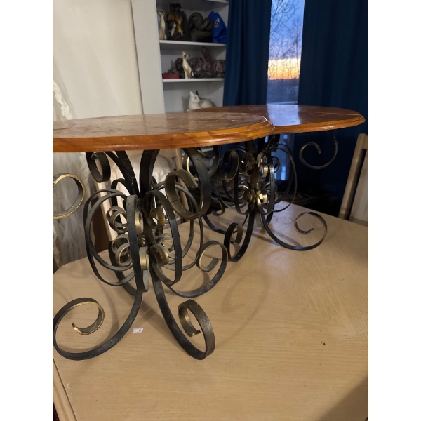  wood-top console table with a black and gold wrought iron base. 