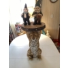 Image 4 :  Leopard, cat table, and garden gnomes.
