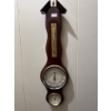Image 1 : Wm. Widdop mahogany banjo weather station featuring a barometer, thermometer, and hygrometer. 
It is