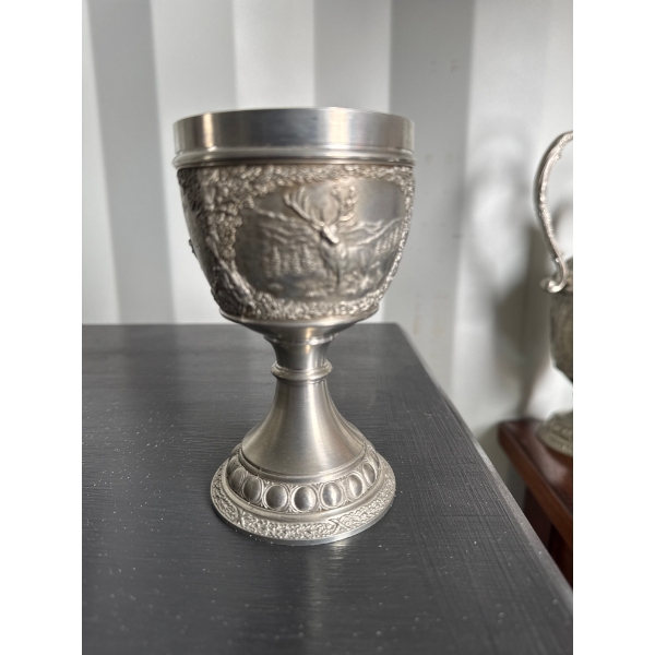 This item is a vintage German SKS 95% Zinn (Tin) Pewter Goblet featuring an embossed countryside sce