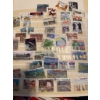 Image 1 : Canadian postage stamps housed in three albums, featuring a variety of commemorative, definitive, an