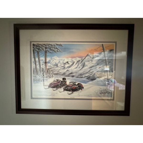  Framed art print titled "Riding High" featuring Polaris Indy Storm Classic snowmobiles, signed and 