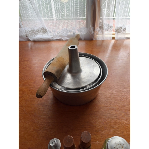 Glass canning jars, metal kitchenware, a porcelain tea set, animal figurines, magnifying glasses, se