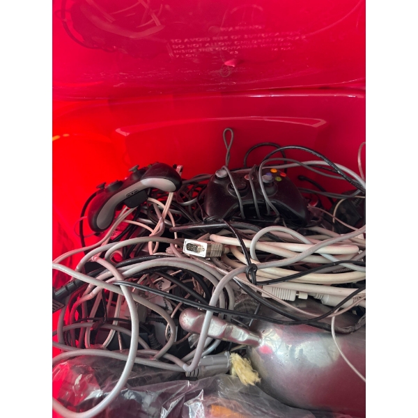 Box of electronics just packed up. Condition, unknown. Remote controls. All kinds of items.