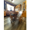 Image 5 :  wooden dining set with a drop-leaf or extendable table and matching chairs. 