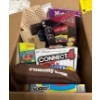 Image 1 : Box full of games. Scrabble, Connect Four, Rummy, Sori, Go Fish, Chinese checkers, and chess.