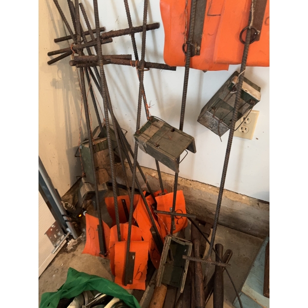 Bag of metal casters with mounting plates, several large metal pipe wrenches, hand tools, and multip