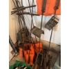 Image 1 : Bag of metal casters with mounting plates, several large metal pipe wrenches, hand tools, and multip