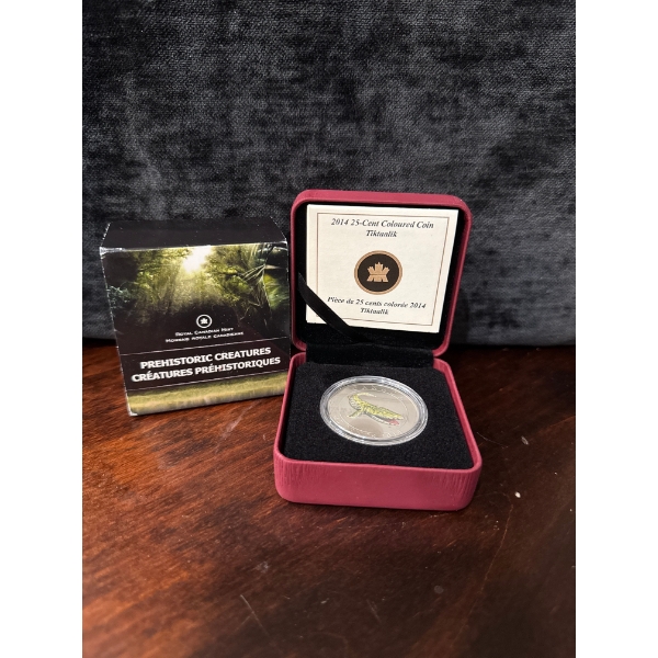 a 2014 25-cent coloured and glow-in-the-dark coin from the Royal Canadian Mint featuring the prehist