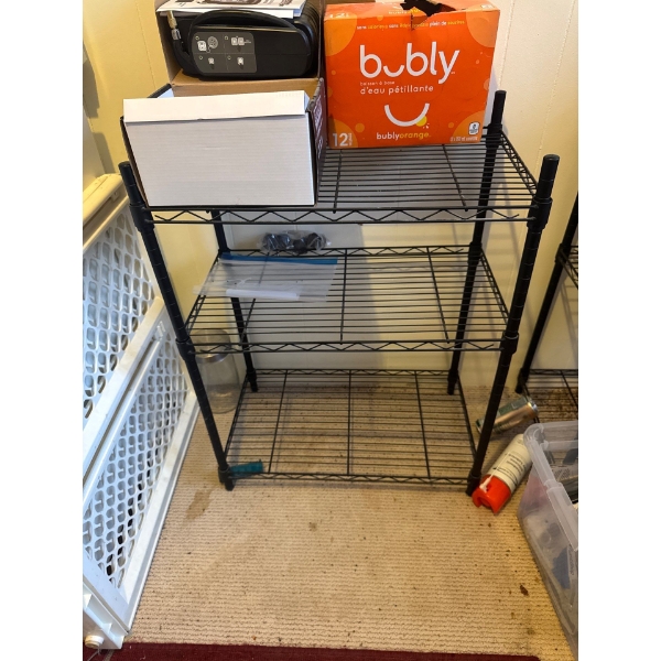 Black metal rack, 23in wide 13in deep and 28in high, sturdy and versatile.