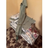 Image 2 : One green patio umbrella and a selection of outdoor seat and back cushions with floral and patterned