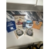 Image 1 : Vintage Polaris and Skidoo collectibles, Yamaha candle holder, cookbooks, and decorative snowmobile 