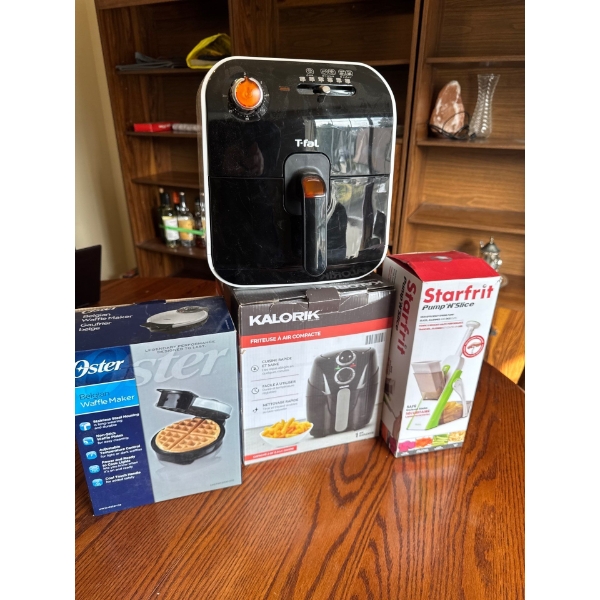 Clean T-fal airfryer, new in box Oster waffle iron, new in box Kalorik airfryer and new in box Starf