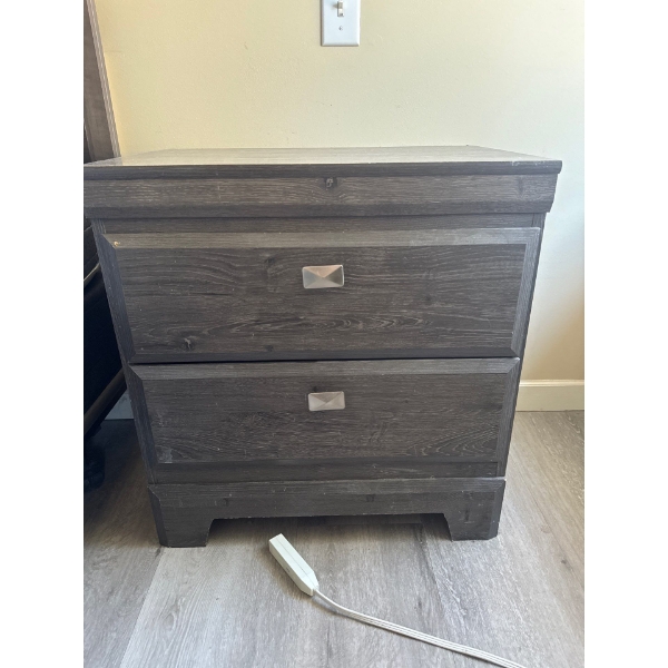 Nightstand with two drawers. 23 and a half inches wide by 25 inches tall by 15 and a half inches dee
