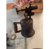 Image 11 : One metal blow torch with a wooden handle, one ribbed metal oil or fuel can, and a group of metal an