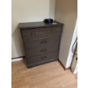 Image 4 : This vintage-style wooden dresser features ornate carved drawer fronts, brass-colored handles, and a