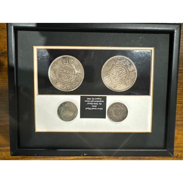 Saudi Arabian Silver Riyal coins salvaged from the shipwreck of the SS John Barry, which was torpe